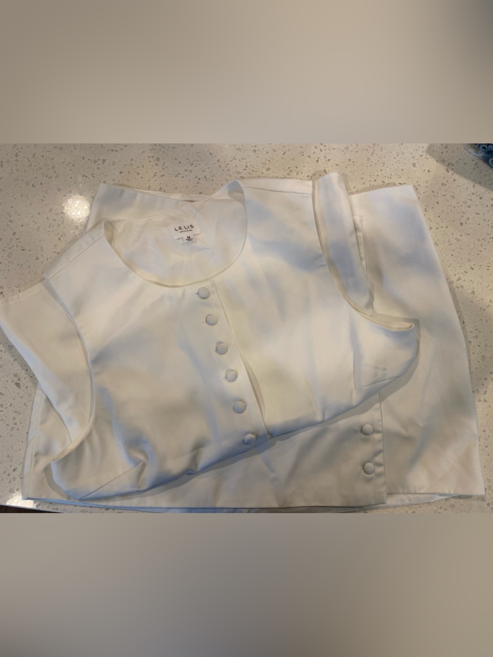 Le Lis Cream Sleeveless Button-Front set